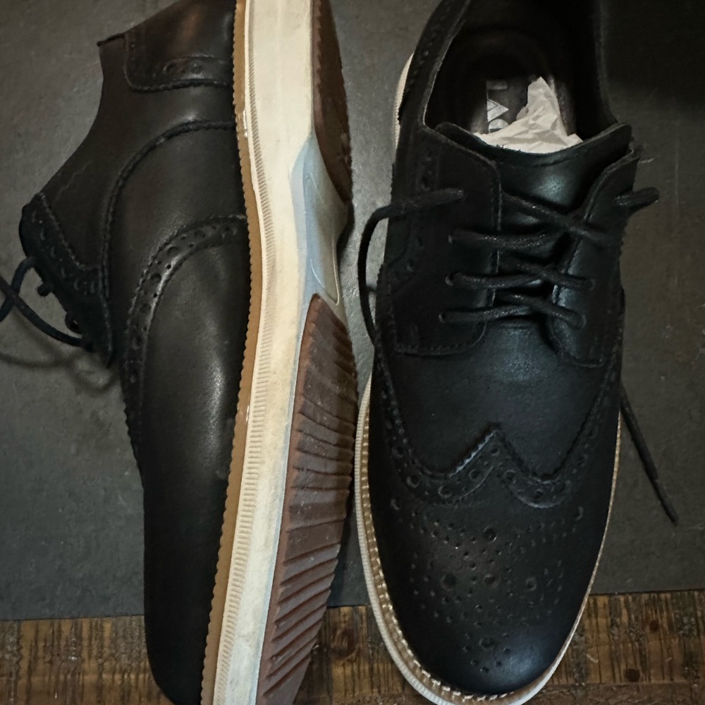 Black Leather Oxfords with Wingtip detailing.